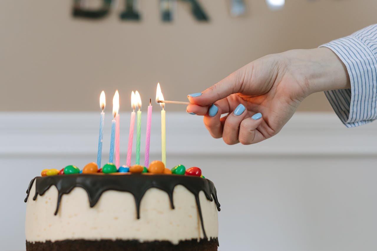 A colorful illustration showing birthday candles and numbers